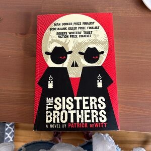 Free with purchase: The Sisters Brothers by Patrick deWitt